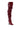 The AZALEA WANG STEPHAN BURGUNDY BOOT is a single over-the-knee boot crafted from shiny maroon leather. It boasts a slouchy, gathered design along the shaft and features a pointed toe with an elegantly curved high heel.