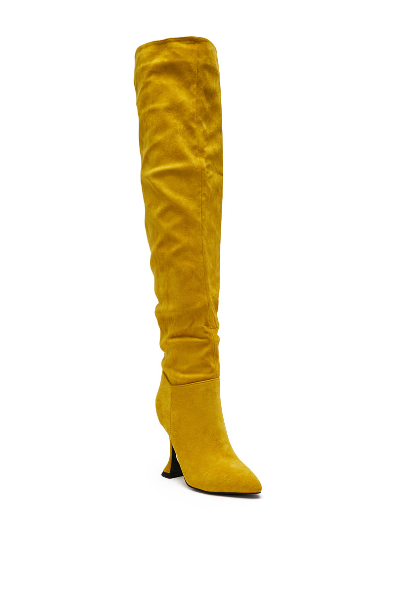 The AZALEA WANG STEPHAN YELLOW SUEDE CHUNKY BOOT features bold yellow suede and a high heel, perfect for making a statement.