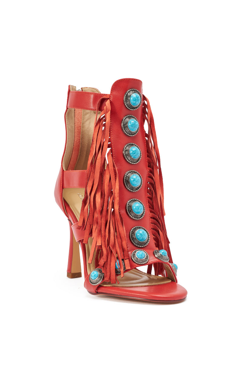 The AZALEA WANG SUMAC Red Fringe Western Stiletto Sandal features red fringe, turquoise stone accents, an open toe, and a back zipper for easy wear—a bold western statement heel. 4