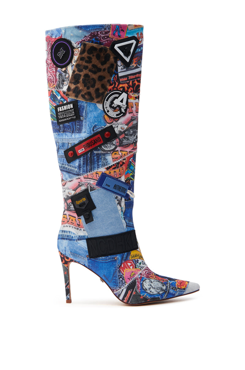 The AZALEA WANG SYTILA MULTI ABSTRACT BOOT is a knee-high boot with a vibrant collage of patches, denim, leopard print, and colorful graphics. It features a pointed toe and a slender stiletto heel for added elegance.