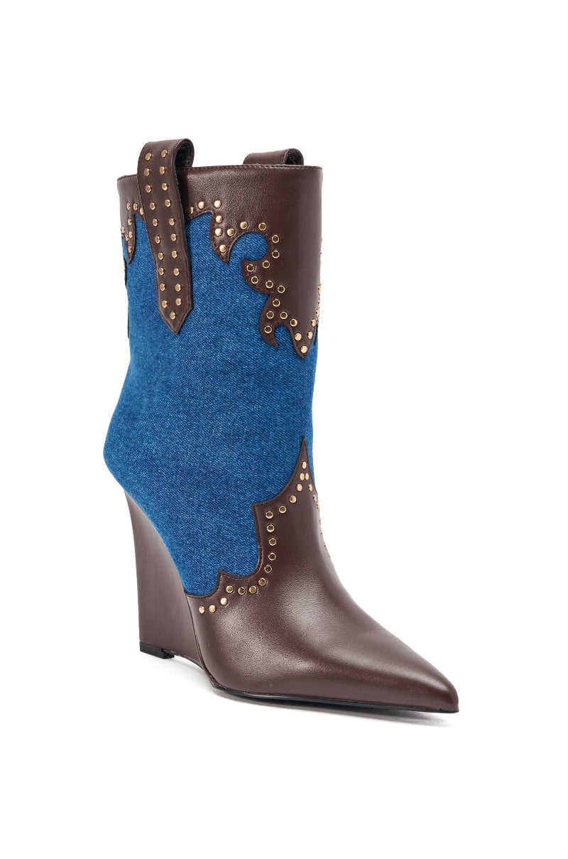 The AZALEA WANG TALLULAH DENIM WEDGE WESTERN BOOTIE features brown leather with gold studs, blue denim panels, a pointed toe, and sleek faux leather trim with pull tabs.