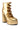 The AZALEA WANG TAMALA GOLD CHUNKY PUMP is a gold high-heeled shoe with a platform sole and an ankle-length design, made from faux metallic leather. It features side cut-outs with strappy buckle accents for fastening, along with a thick rectangular heel that provides a shiny, metallic finish.