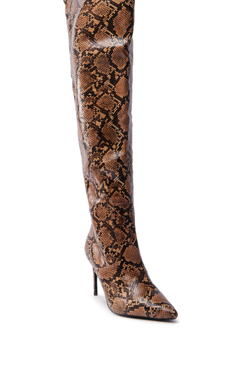Introducing the AZALEA WANG TARRANT SNAKE WESTERN TOPLINE BOOT: a knee-high stiletto featuring a pointed toe, made of faux leather in an eye-catching brown snake print.
