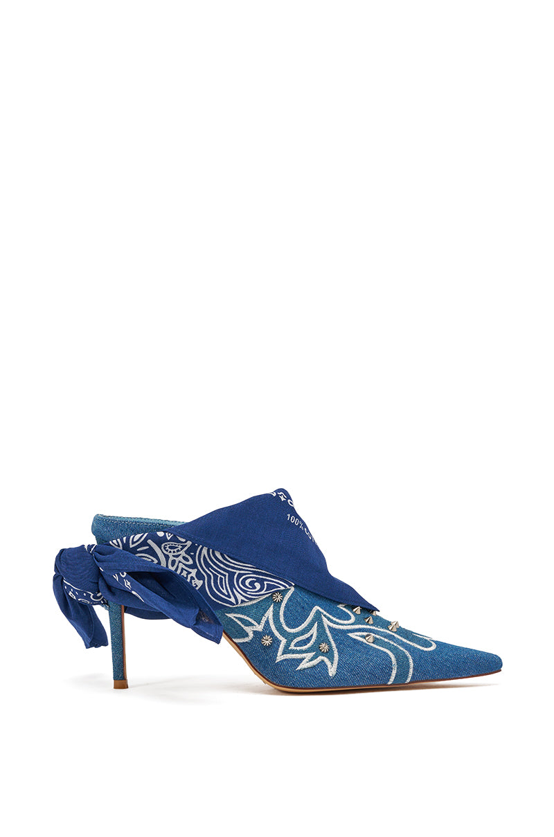 The AZALEA WANG TAVINE DENIM MULE PUMP WITH BANDANA DETAIL features blue denim, a pointed toe, stiletto heel, white paisley pattern, and a blue bandana detail wrapping the upper and heel. 5
