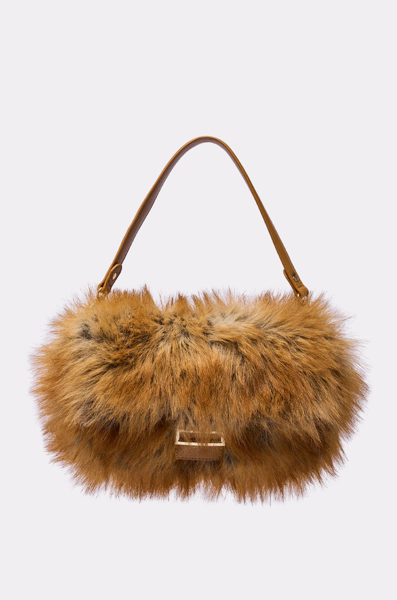 The REALLY LIKE THAT FAUX FUR PURSE is a brown, fluffy faux fox fur handbag with a leather strap, rectangular gold clasp, and detachable shoulder strap, shown against a plain white background.