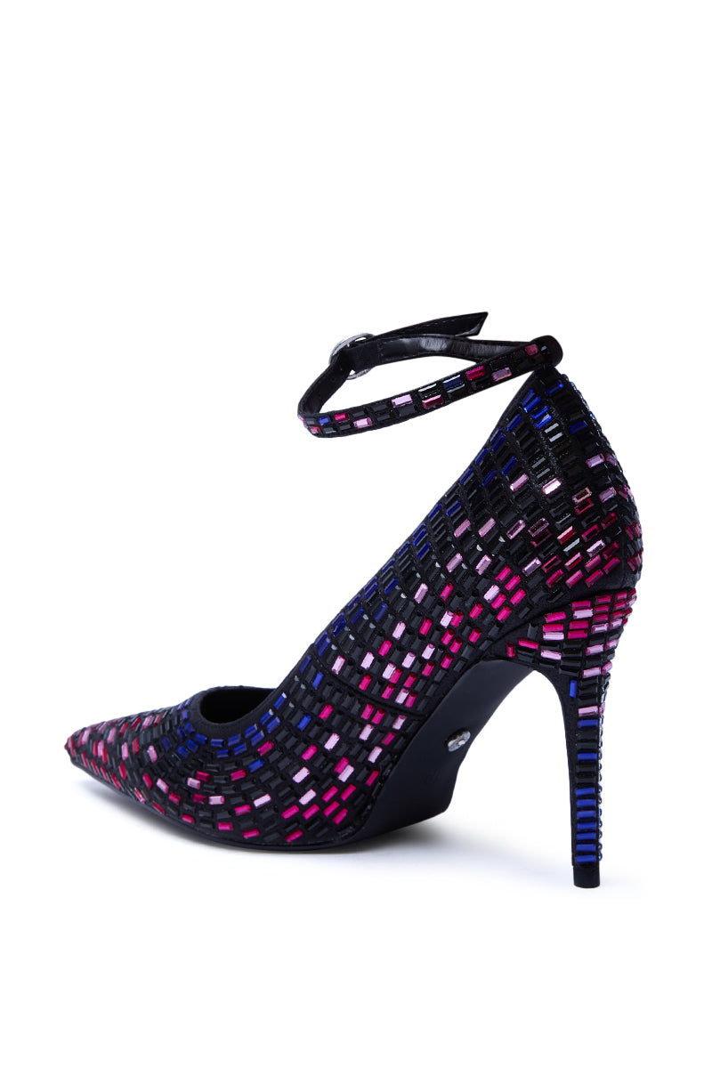 The AZALEA WANG TEAGAN BLACK MULTI RHINESTONE STRAP PUMP features a pointed toe, stiletto heel, and a woven pattern in black, purple, pink, and blue hues with a chic rhinestone strap for a stylish modern look.