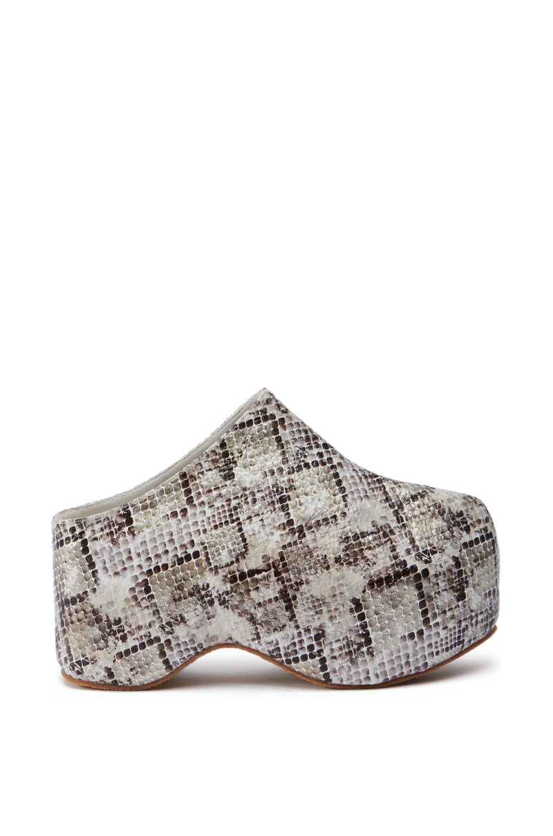 A side view of the AZALEA WANG TEATREE SNAKE FLATFORM shoe showcasing a faux snakeskin pattern in shades of beige, gray, and brown. The shoe features a chunky, curved sole and closed toe, providing a bold and stylish appearance.
