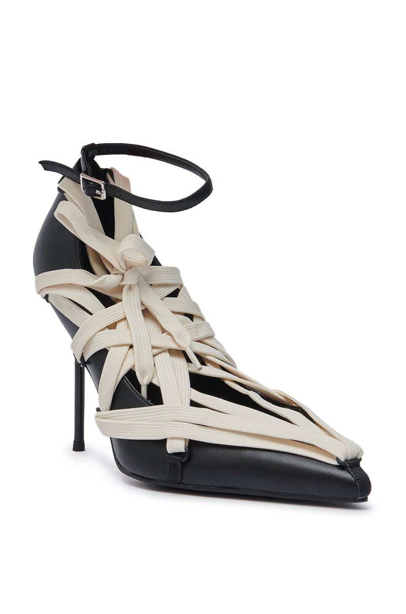 The AZALEA WANG TELWONE LACES DETAIL PUMP is a black pointed toe stiletto with wide cream ribbon laces wrapped around the shoe and an ankle strap with buckle.