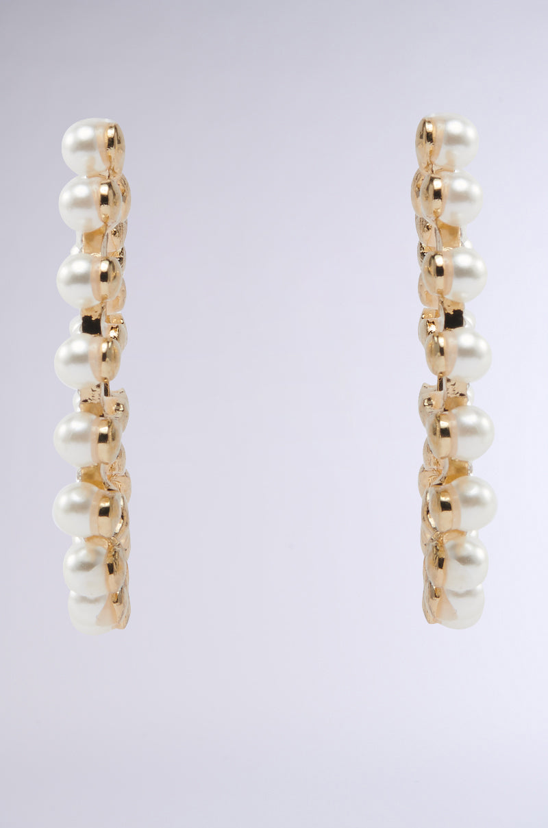 EVERYTHING YOU WANT EARRING: Gold hoop earrings adorned with pearl details and rhinestone accents, displayed on a plain light gray background. 5