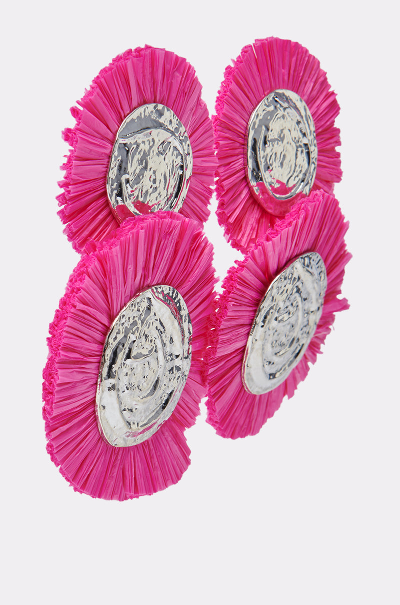 Four circular objects with shiny silver centers and bright hot pink fringed edges, arranged closely together on a light background, resemble bold statement jewelry pieces like the IN MIAMI EARRING. 3
