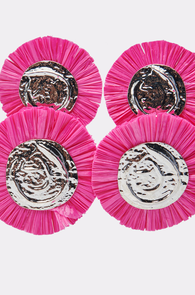 Four IN MIAMI EARRINGS—featuring circular shapes, hot pink fringe, and textured metallic silver centers—are clustered on a white background, highlighting their bold style. 4