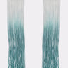 The REBRAND EARRING features long tassel fringe with rectangular tops and strands that fade from white to teal in a bold blue ombre gradient, making a striking statement.