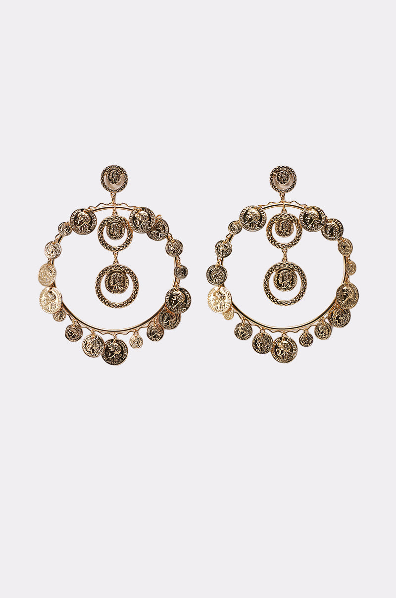 BOHO EARRING: Antique gold-tone hoops with intricate coin-like charms and textured circular patterns, featuring a large central hoop and dangling discs, shown on a plain white background. 1