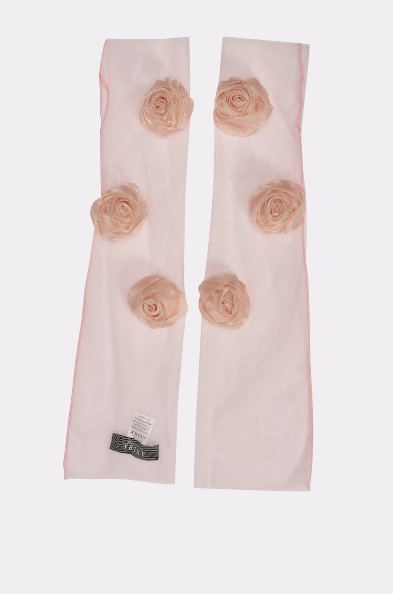 Introducing the SPRING SZN APPLIQUE GLOVES: sheer light pink mesh gloves adorned with six bold rose appliques, pink stitching, and a clothing label—unique accessories ideal for making a dreamy festival statement. 5