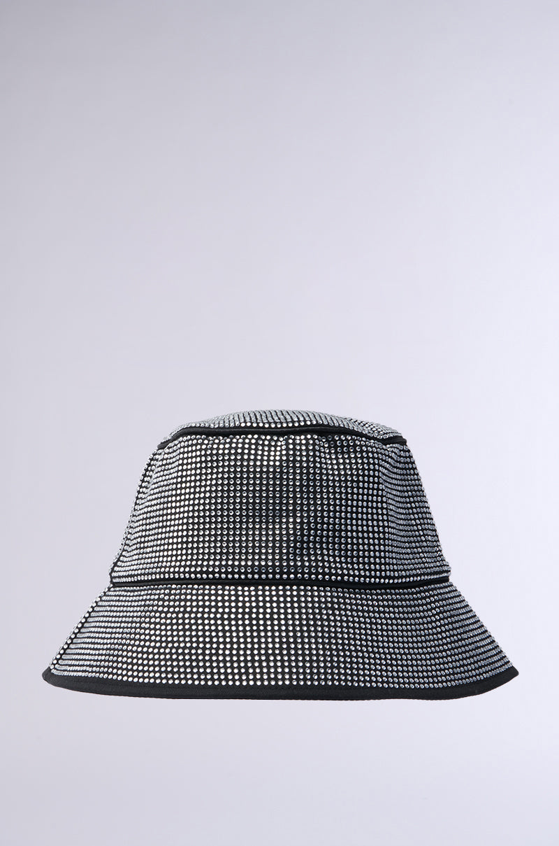 The PAY ME BLING BUCKET HAT by AKIRA Label is a black hat adorned with a grid of small, reflective silver rhinestones, shown against a plain light gray background.