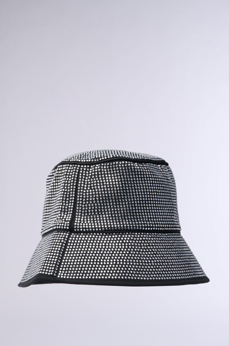 The PAY ME BLING BUCKET HAT, in silver with sparkling rhinestone embellishments and black seam trim, is shown against a plain light gray background.