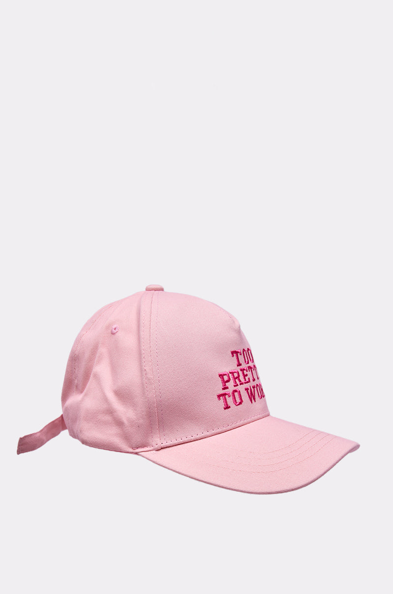 The I SAID WHAT I SAID HAT is a light pink, embroidered baseball cap with an adjustable strap and "I SAID WHAT I SAID" in bold pink letters—an ideal playful statement piece for any casual outing. 2