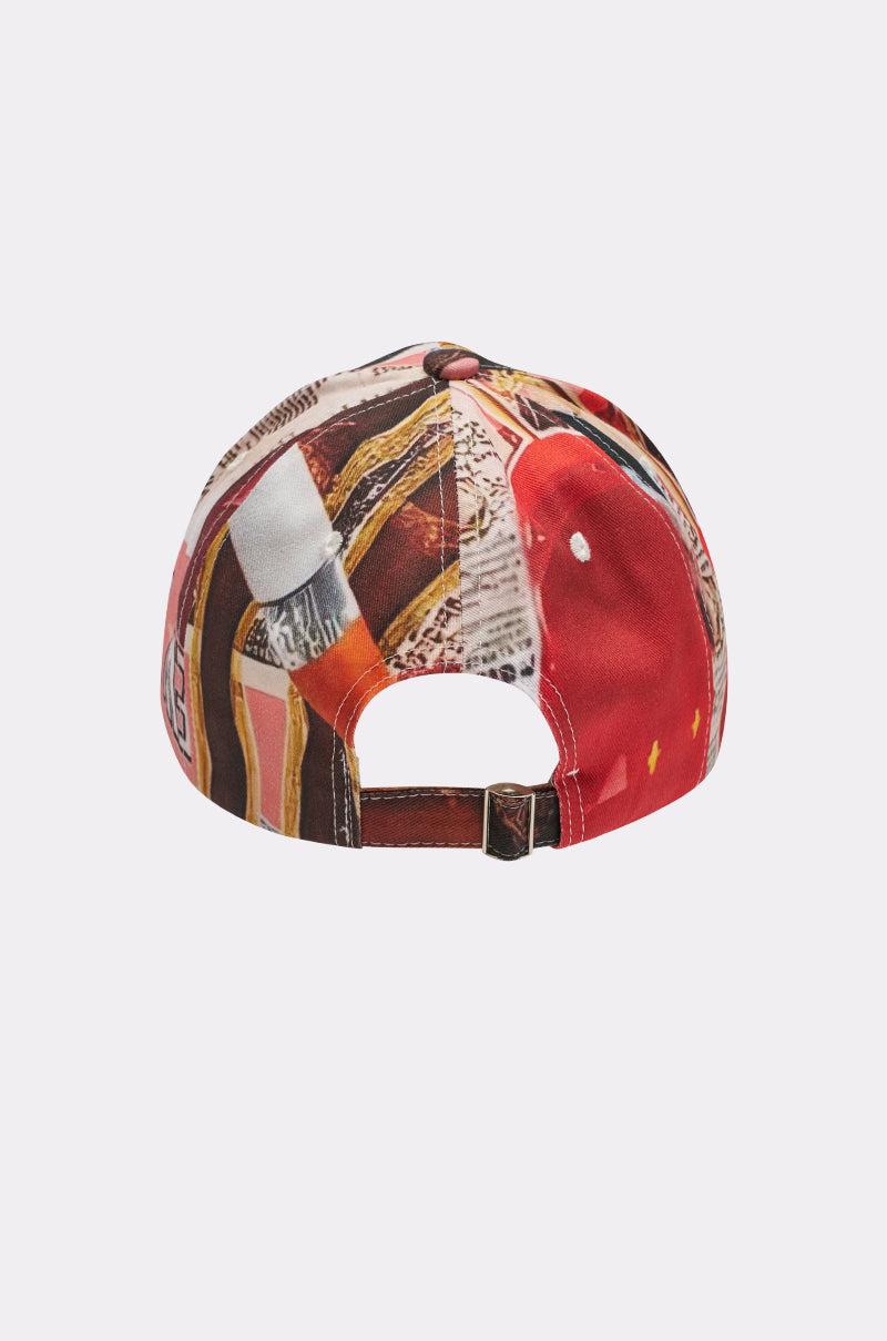 The IN THE ZINE PRINT HAT is a vibrant baseball cap with a street-style, magazine-inspired abstract pattern, an adjustable strap with metal buckle at the back, all set against a plain white background. 5
