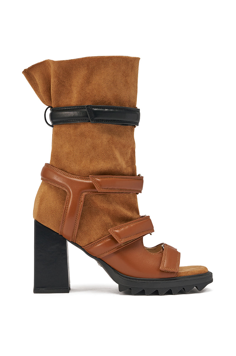 The AZALEA WANG THIERRY Tan Faux Suede Open Toe Chunky Bootie features a black block heel, brown faux suede upper, tan leather straps with adjustable buckles, black accents, and a treaded platform sole for style and stability. 2