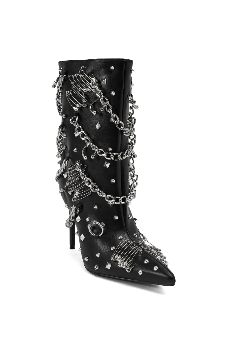 The AZALEA WANG THRIGRUN BLACK SILVER HARDWARE STILETO BOOTIE features black faux leather, a pointed toe, metal studs, silver chains, and safety pins for a bold, punk-inspired edge.