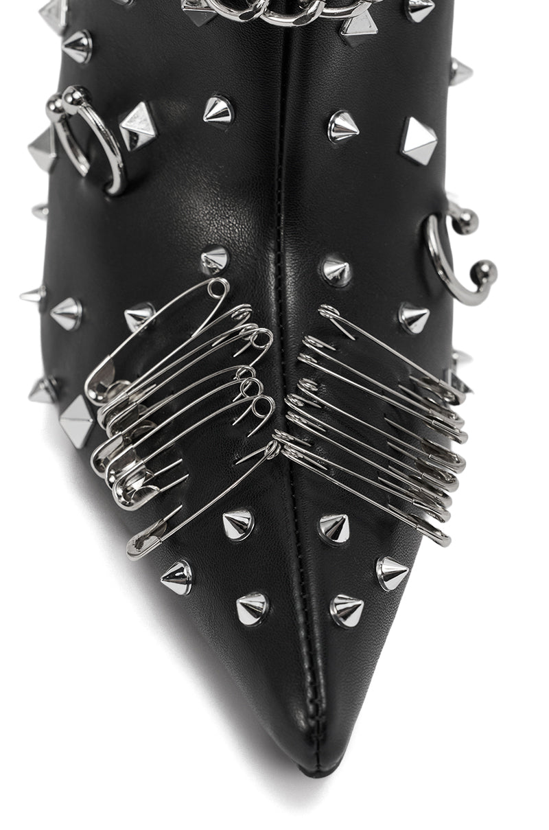 The AZALEA WANG THRIGRUN Black Silver Hardware Stiletto Bootie features black faux leather, a pointed toe, and bold silver studs, spikes, and safety pins across the front.