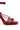 A close-up of the AZALEA WANG THUNDERMINE Red Velvet Embellished Stiletto Sandal showcases multiple thin straps across the foot and ankle, featuring a sleek design and an elegant, rich color. The visible heel highlights the shoe's stylish and modern look.