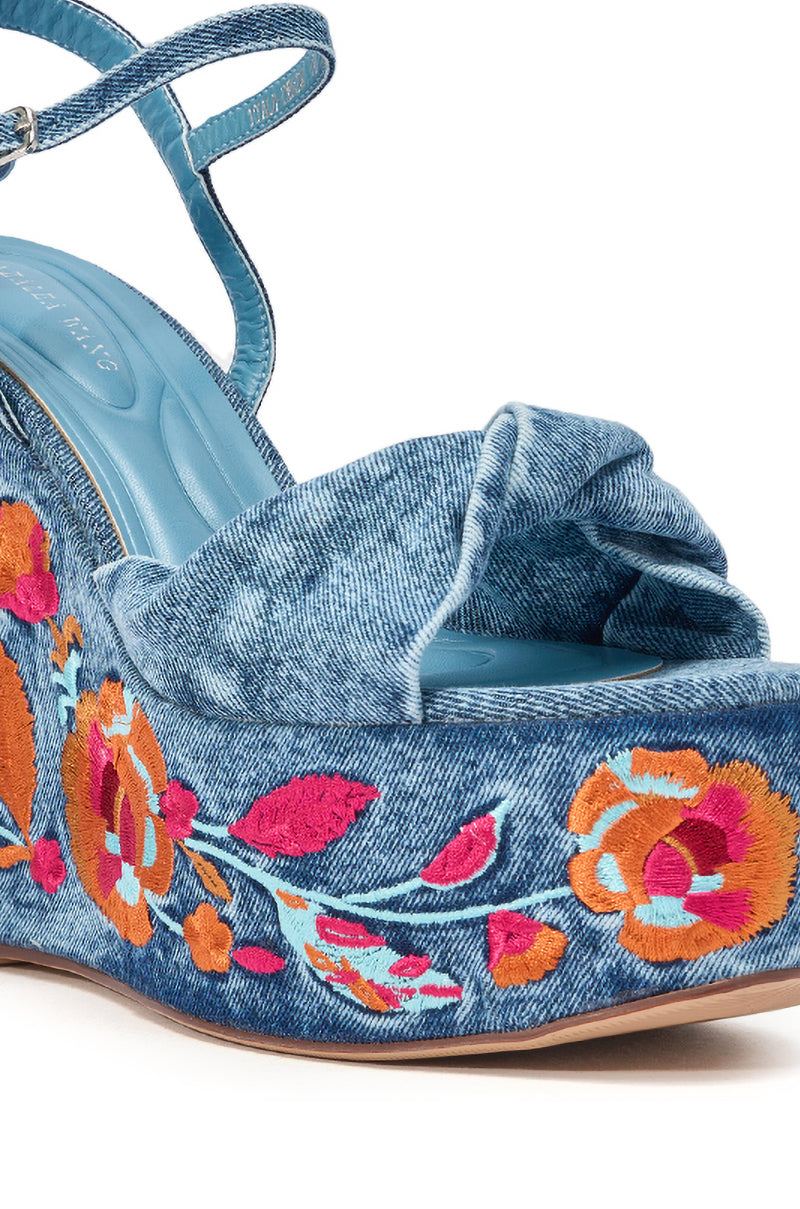 The AZALEA WANG TIALA DENIM FLORAL EMBROIDERED STRAP WEDGE SANDAL showcases a twisted strap and vibrant orange, red, and pink floral embroidery on the denim platform heel. 7