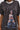 A person models the IT GIRL SPLATTERED GRAPHIC TSHIRT DRESS WITH RHINESTONES, featuring 