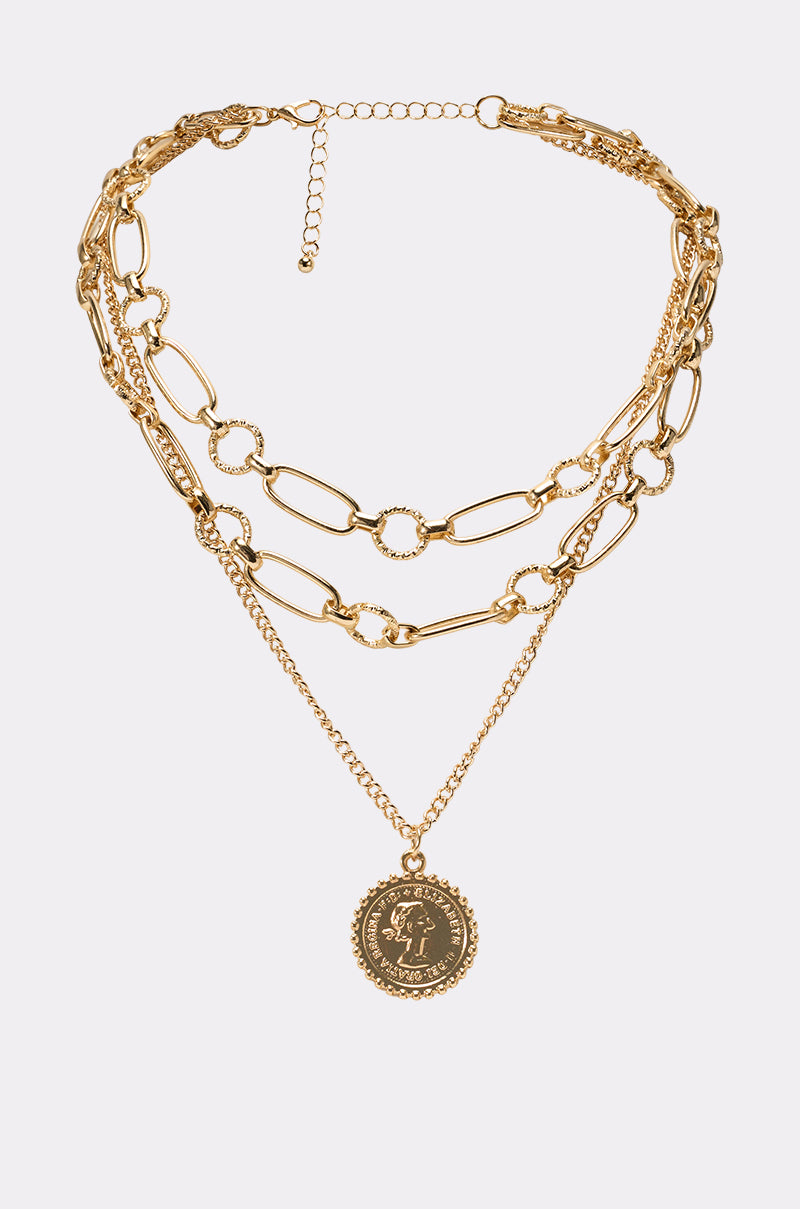 The GET THAT COIN NECKLACE features thick and thin layered gold chains, round and elongated links, plus a central coin pendant—perfect as statement festival jewelry. 0