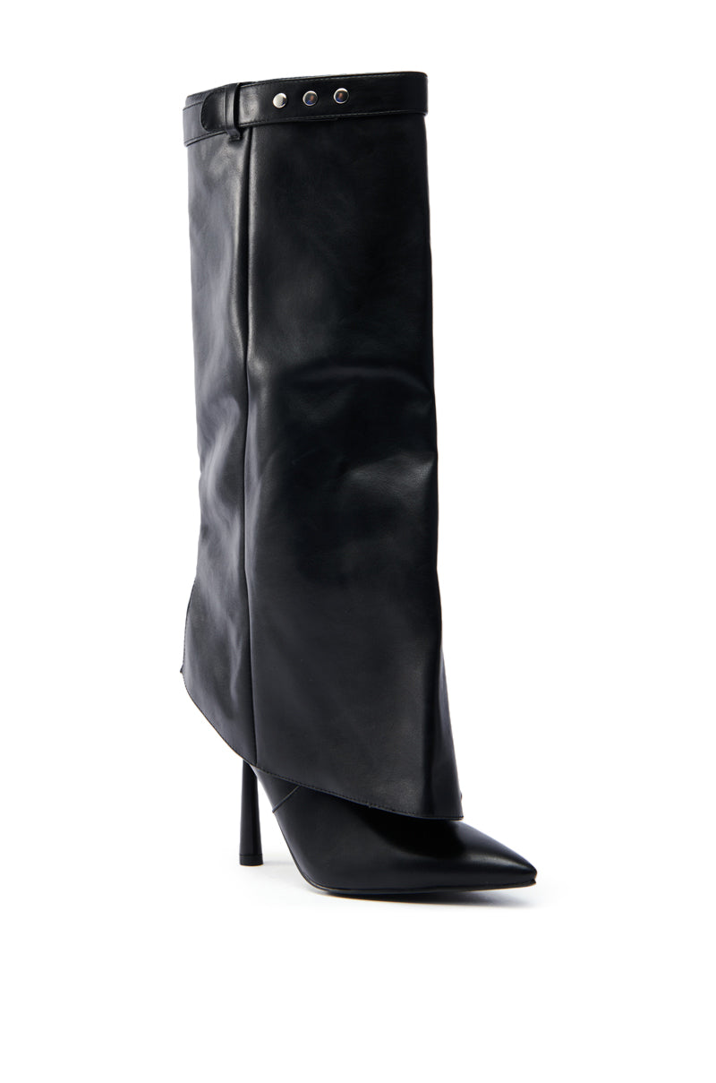 The AZALEA WANG TRACKSTAR BLACK STILETTO BOOT is a high-fashion black faux leather boot featuring a sleek stiletto heel, pointed toe, knee-high shaft, and a band with silver studs for a stylish and glossy modern look.