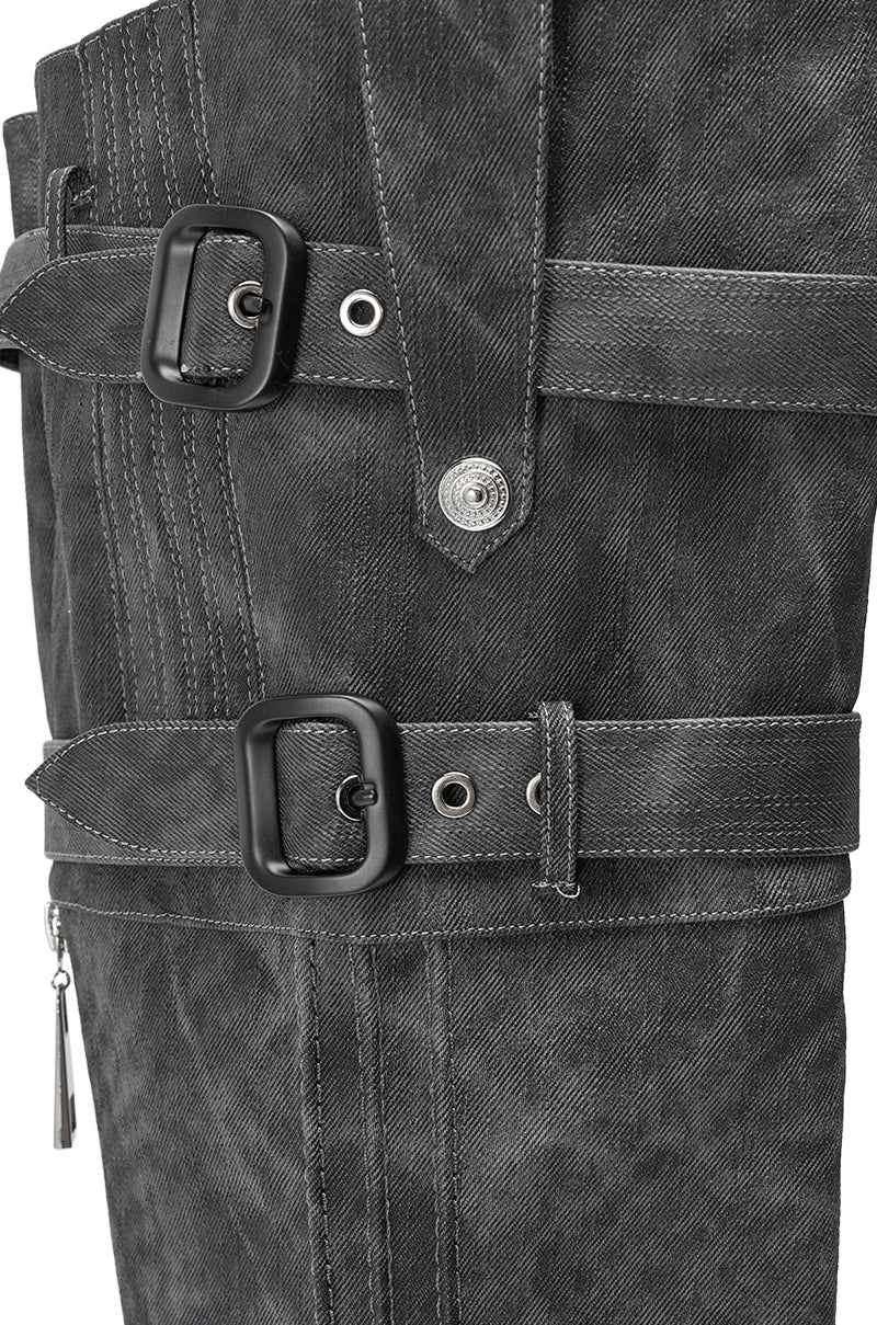Close-up of the AZALEA WANG TRILLION CHARCOAL CHUNKY THIGH HIGH BOOT in textured black denim with silver rivets, two black buckle straps with metal eyelets, and white stitching for a rugged, detailed look.