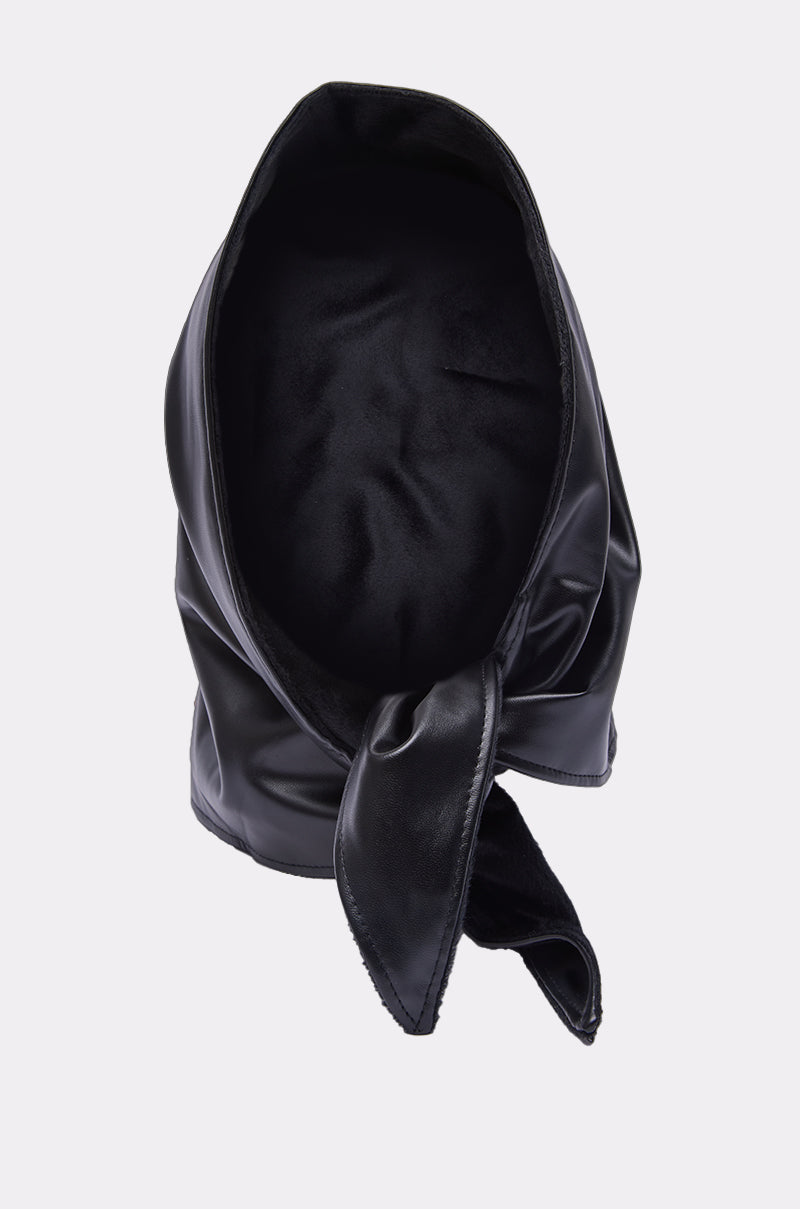 The ITS A WRAP PU HOOD is a black hood made from PU with a soft inner lining and a tied knot detail at the front, adding an edgy fashion touch. Displayed on a plain light background.