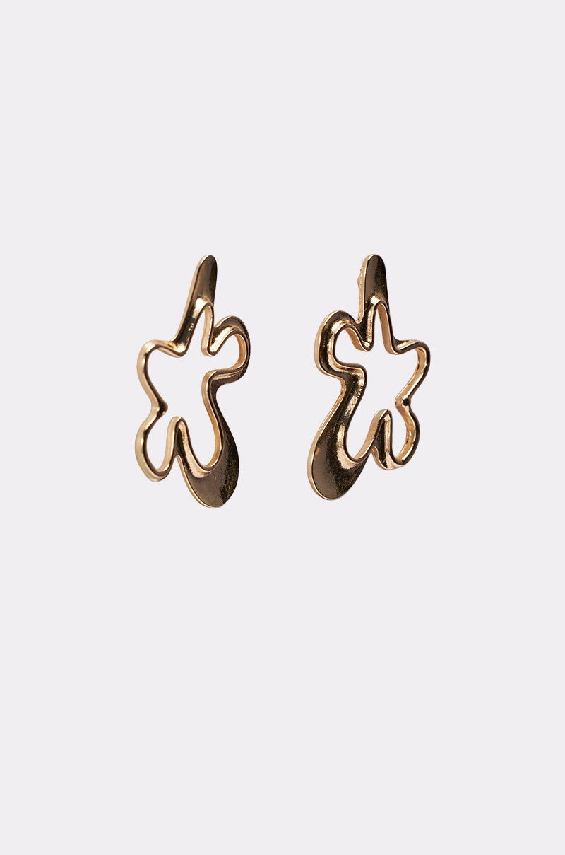 The VIC EARRING features gold-tone, abstract floral-inspired shapes with open, irregular petal designs, showcased against a plain light background. 2