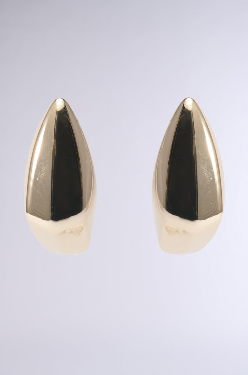 The ZELLY STATEMENT EARRING, with its gleaming faux gold finish and sculptural design, is displayed side by side against a simple gray background, highlighting their reflective elegance. 2