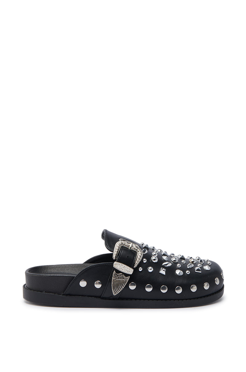 The AZALEA WANG TURIN BLACK METAL EMBELLISHMENT FLAT is a black slip-on mule featuring silver studs, metal embellishments along the sole, and a decorative silver buckle on the front upper.
