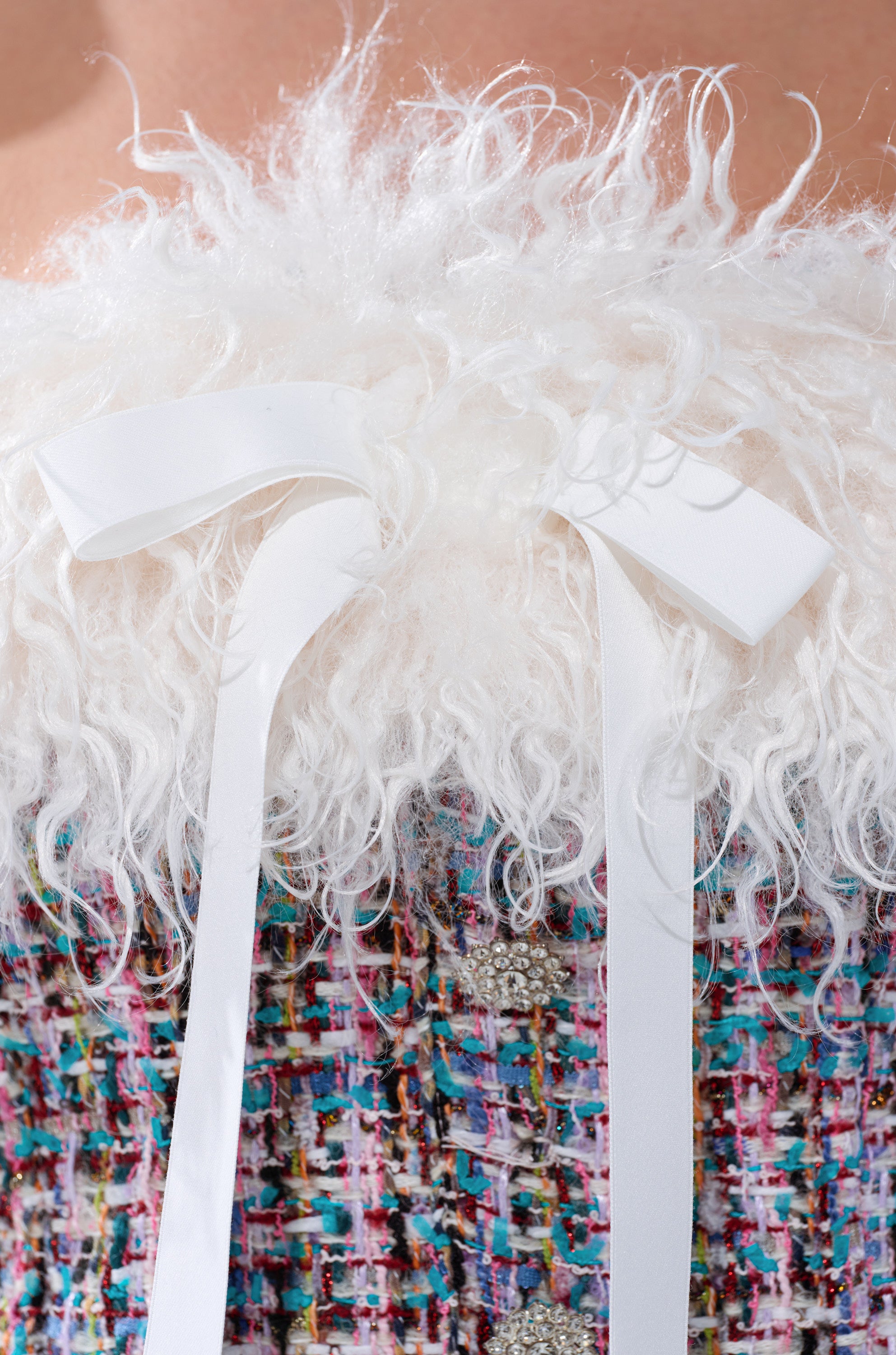 FUR TRIM TWEED CORSET featuring fluffy white fur trim, a white ribbon bow, vibrant textured tweed fabric, and sparkling rhinestone button details.