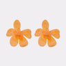 The FRESH START FLOWER EARRING features orange, flower-shaped acrylic earrings with five rounded petals, perfect as a spring accessory and displayed on a plain white background.