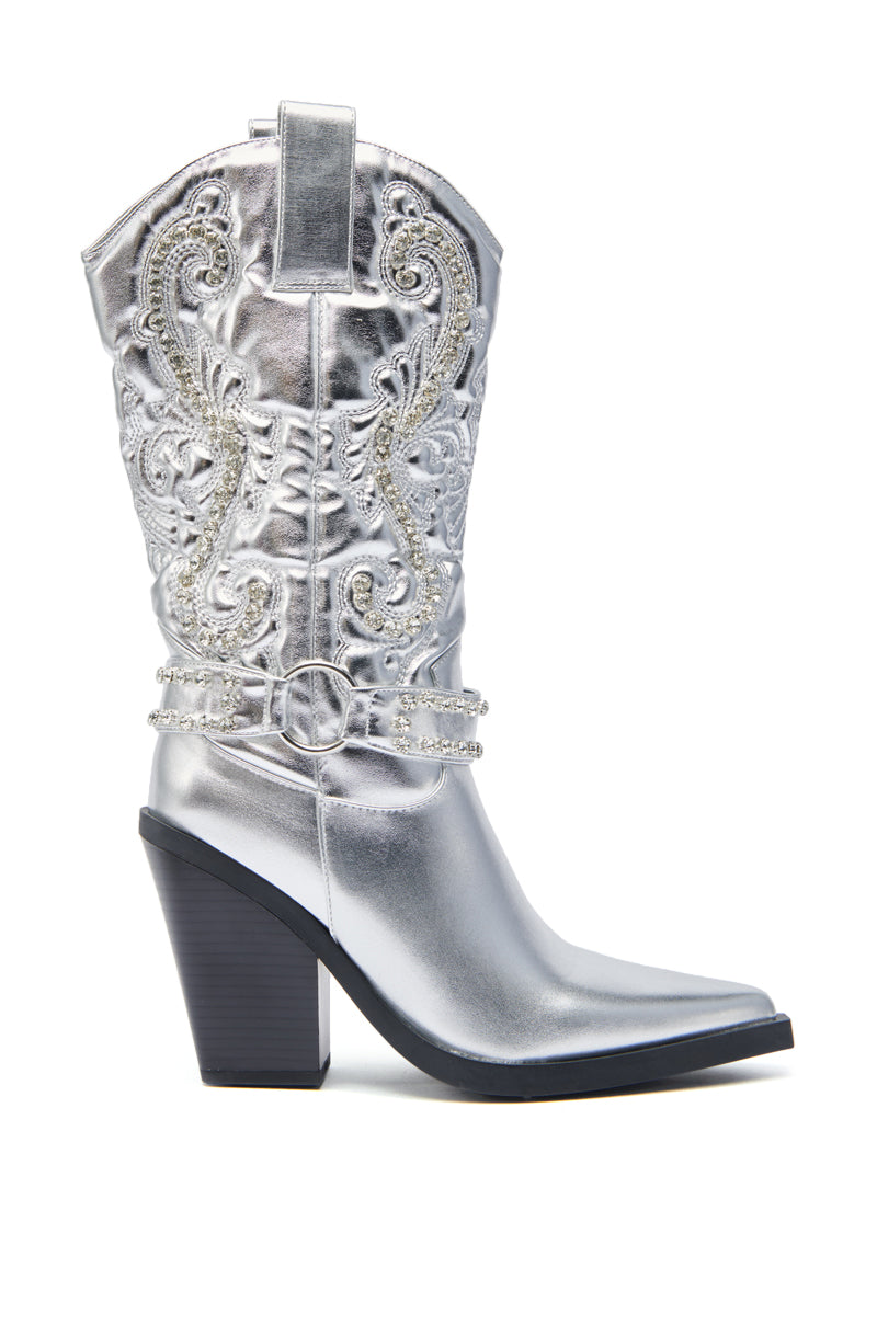 The AZALEA WANG UMBRA SILVER WESTERN BOOT features metallic silver material, baroque embroidery, a pointed toe, chunky high heel, and a chain with circular buckle around the ankle.