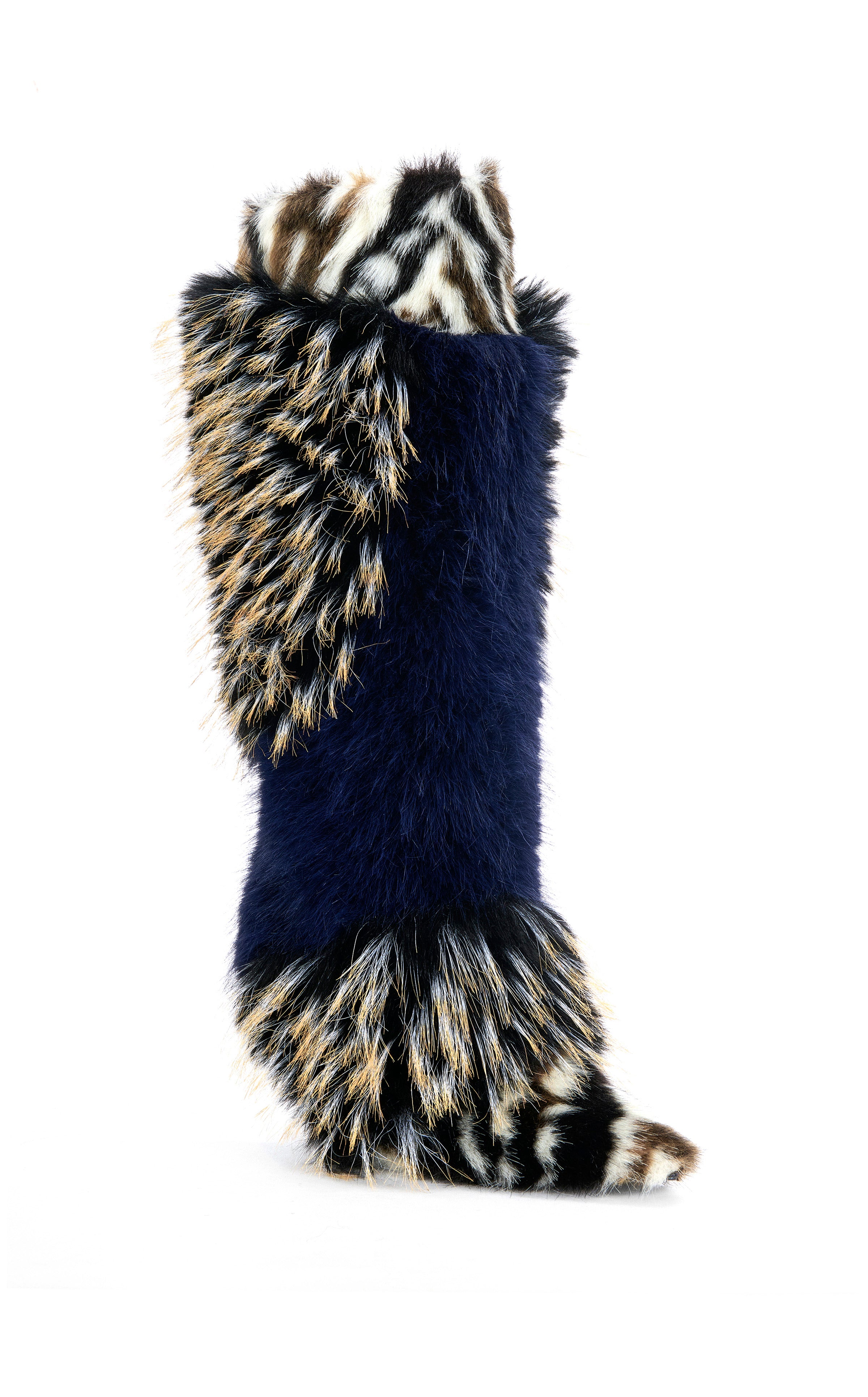 The AZALEA WANG UPENDO NAVY MULTI FUR BOOT features high-fashion faux fur in blue, black, white, and tan animal patterns, a pointed toe, stiletto heel, and high shaft—all styled against a white background.