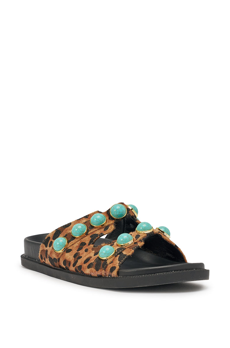 The AZALEA WANG UZUMATI LEOPARD SLIP ON SANDAL WITH STONES features a leopard print calf-hair texture with large round turquoise stone accents on a flat black sole. 5