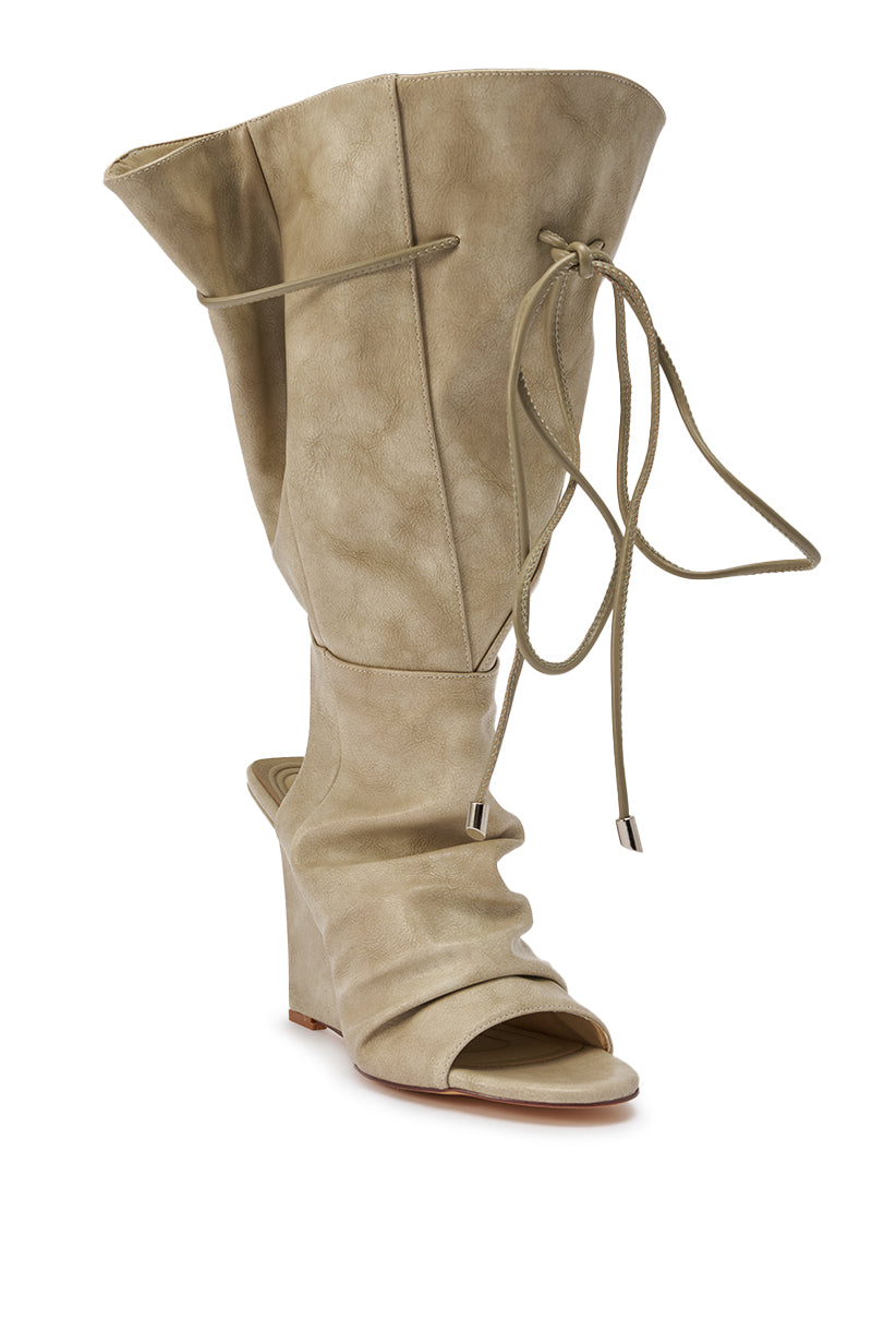 The AZALEA WANG VAILEN GREY OPEN TOE SLOUCHY BOOTIE features a slouchy shaft, decorative front laces, exposed heel, and comfort cushion insole for added ease—all in chic grey. 9
