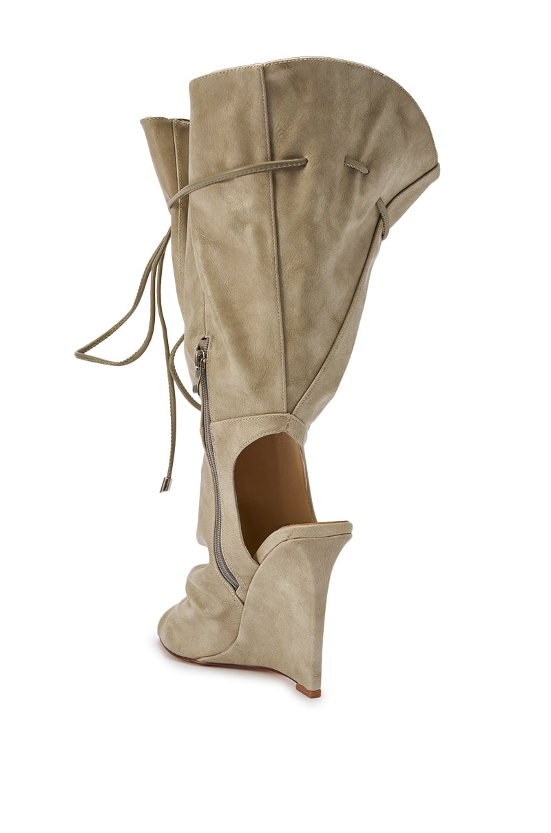 The AZALEA WANG VAILEN Grey Open Toe Slouchy Bootie features a folded-over upper, sculpted wedge heel, front zipper, drawstring ties, and is shown against a white background. 10