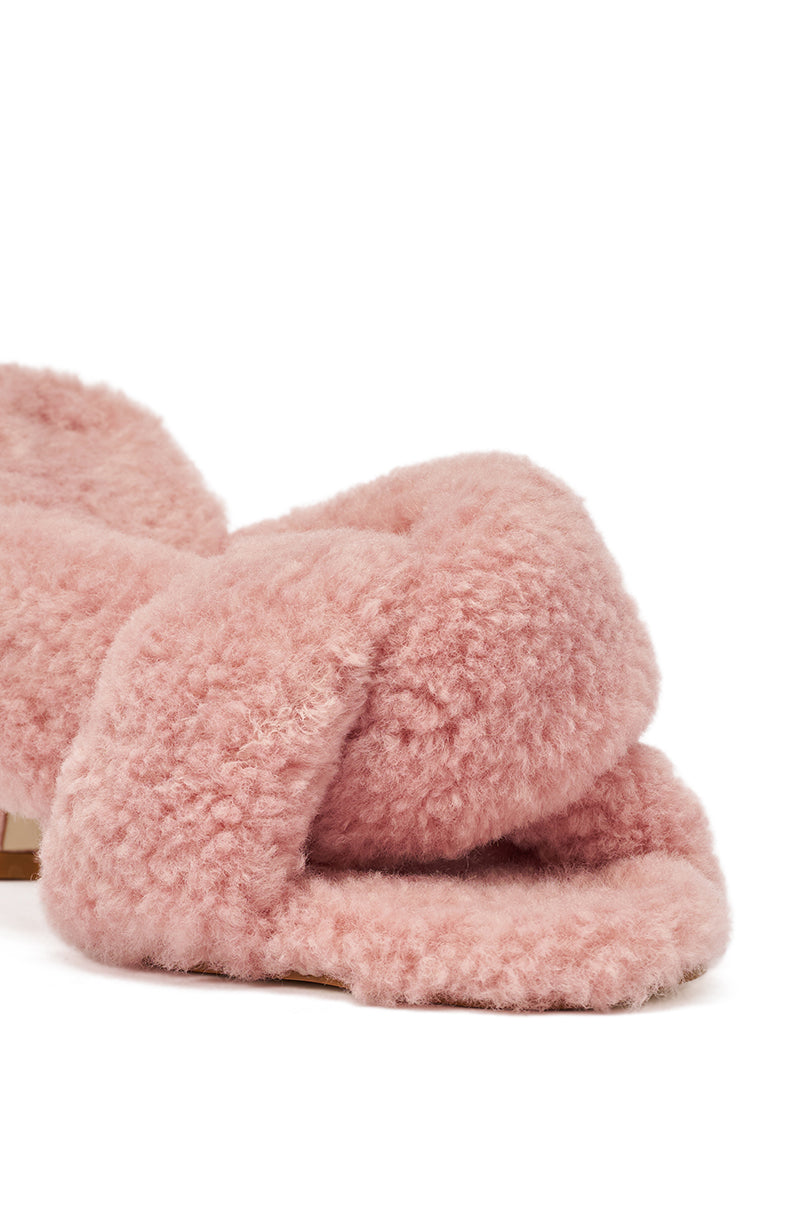 A close-up of the AZALEA WANG Pink Vale Ivory Sherpa Low Heel Mule Sandal features plush, fluffy pale pink crisscross straps—ideal for fans of cozy sherpa sandals. 6