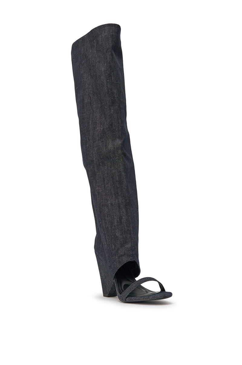 The AZALEA WANG VEONA DARK DENIM OVER THE KNEE CHUNKY HEEL SANDAL features a block heel, open toe, strappy front, and a tall dark denim boot shaft that extends to the knee. 5