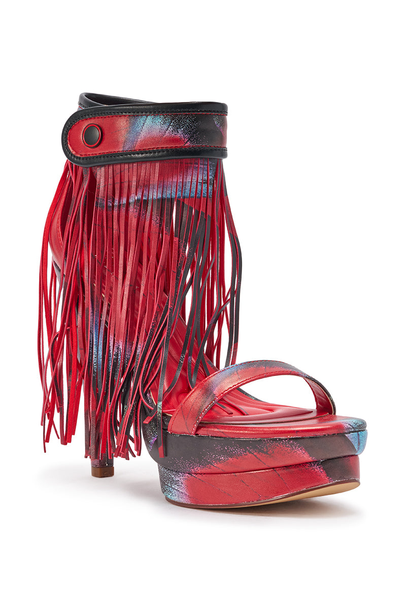 The AKIRA GOLD PRINTED PU FRINGE STILETTO SANDAL flaunts gold print, a striking fringe, and a sleek stiletto heel, blending bold style with playful details for an unforgettable look. 4