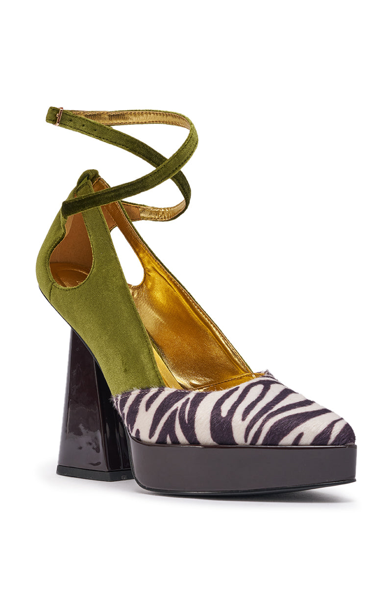 The AZALEA WANG VEVELYN OLIVE BLOCK PUMP features chunky black heels, olive green velvet sides with ankle straps, a metallic gold interior, and a zebra print platform toe—ideal for bold velvet heeled sandal lovers. 4