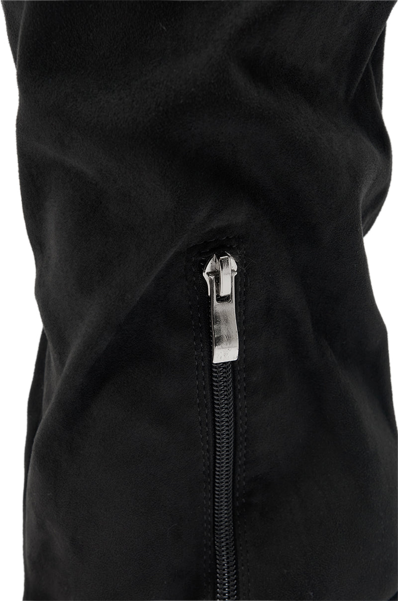 Close-up of the AZALEA WANG VINCE BLACK FAUX SUEDE WEDGE BOOT with a silver zipper partially closed, showcasing the textured black faux suede material.