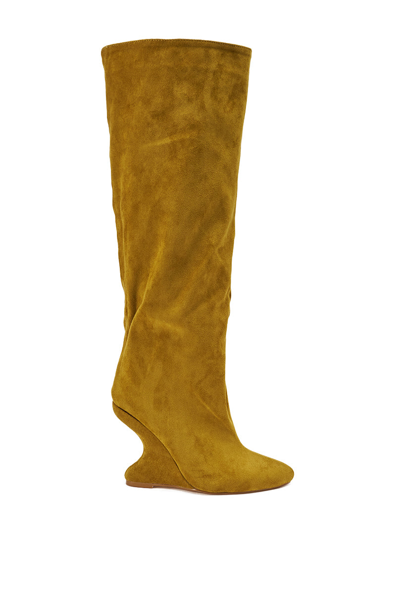 The AZALEA WANG VINCE Mustard Faux Suede Wedge Boot is a knee-high style with a pointed toe and curved wedge heel, shown in mustard yellow faux suede against a plain white background.
