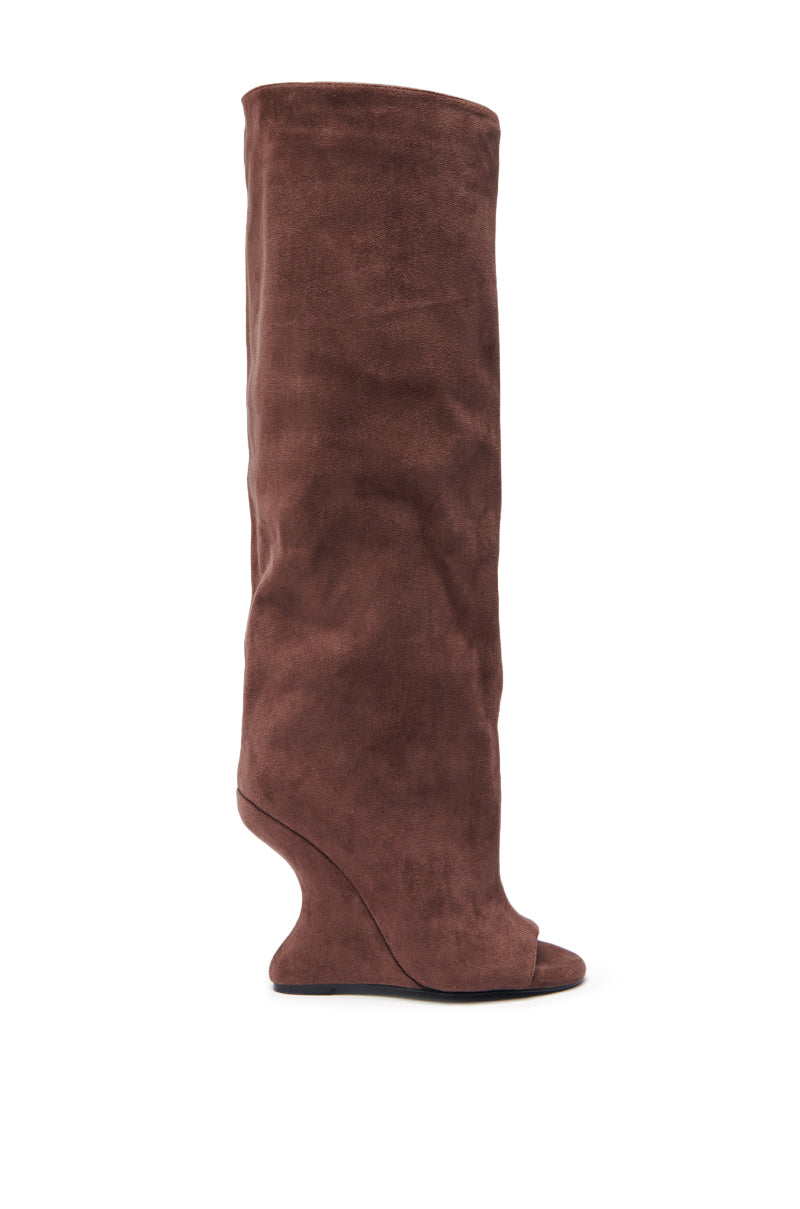 The AZALEA WANG VINCENT BROWN SUEDE OPEN TOE BOOT is a tall, knee-high boot with a unique curved wedge heel, shown in profile against a plain white background.