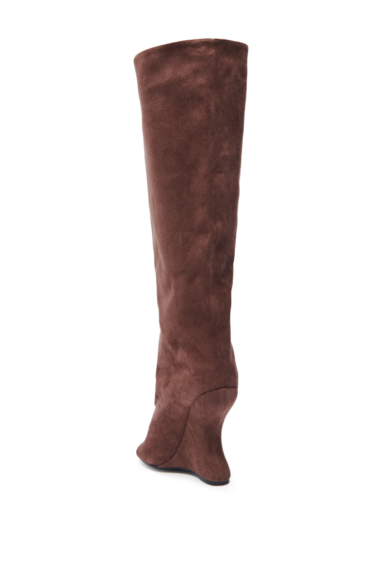 The AZALEA WANG VINCENT BROWN SUEDE OPEN TOE BOOT is a knee-high suede boot featuring an open toe and a sculpted wedge heel, shown against a white background.